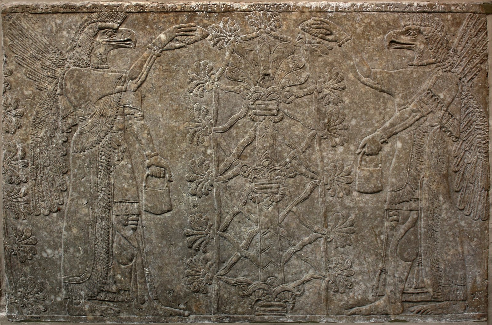 Pair of eagle-headed protective spirits with sacred tree — Nimrud, c. 865–860 BCE